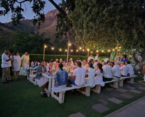 Summers at Harvest Table Bistro calls for long tables with fairy lights (in the garden)