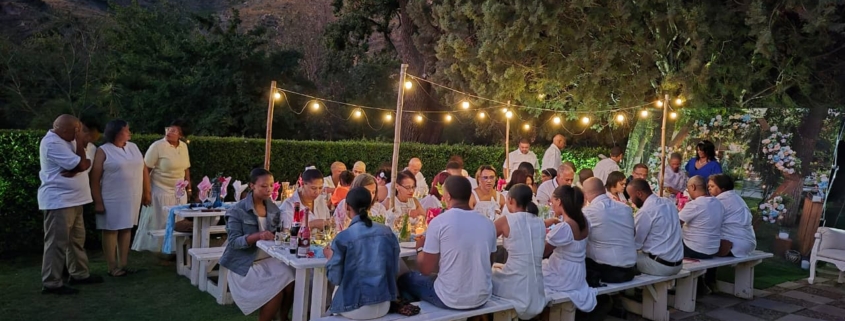 Summers at Harvest Table Bistro calls for long tables with fairy lights (in the garden)